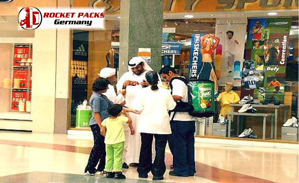 Salesman with hot coffee dispenser backpack Saudi Arabia Mekka